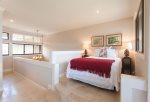 The master bedroom has the added luxury of both a king bed, and a queen bed